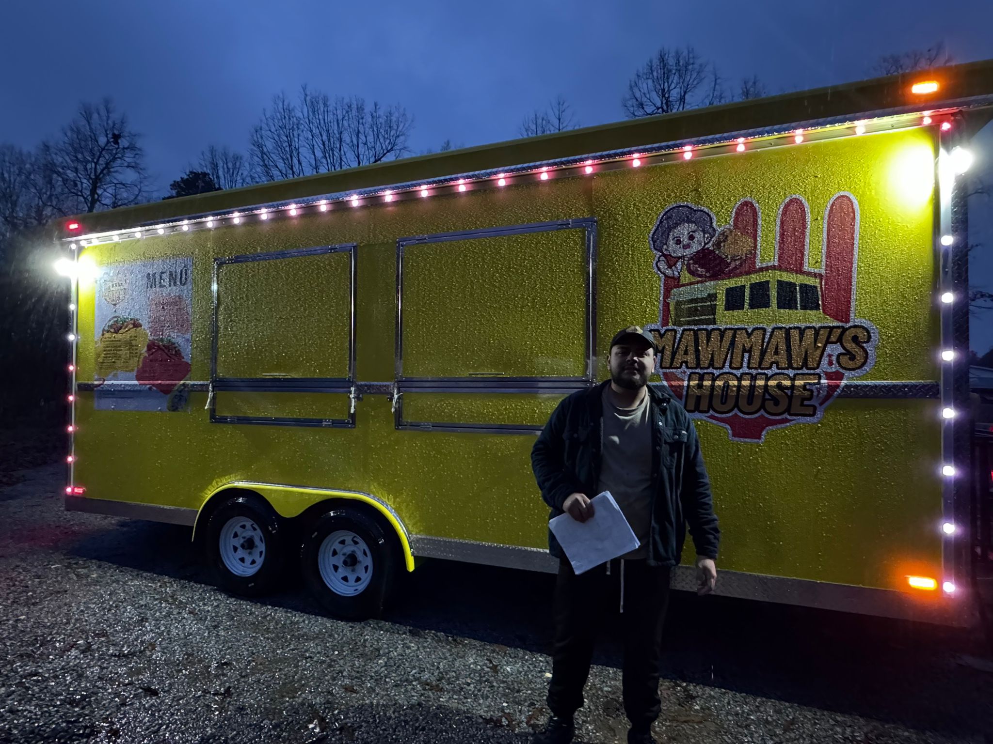 MawMaw's House food trailer lit up at night after delivery