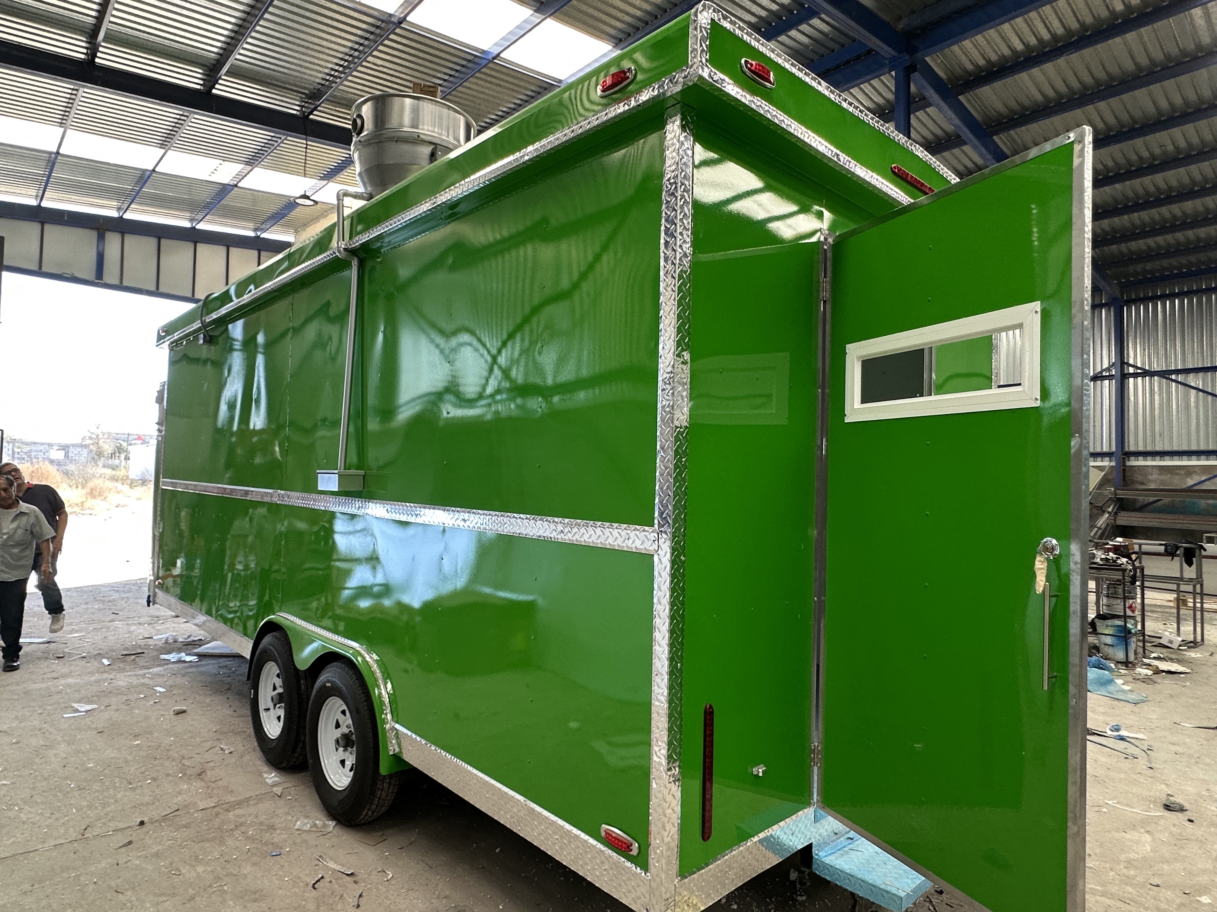 Rear and side perspective of completed NG food trailer