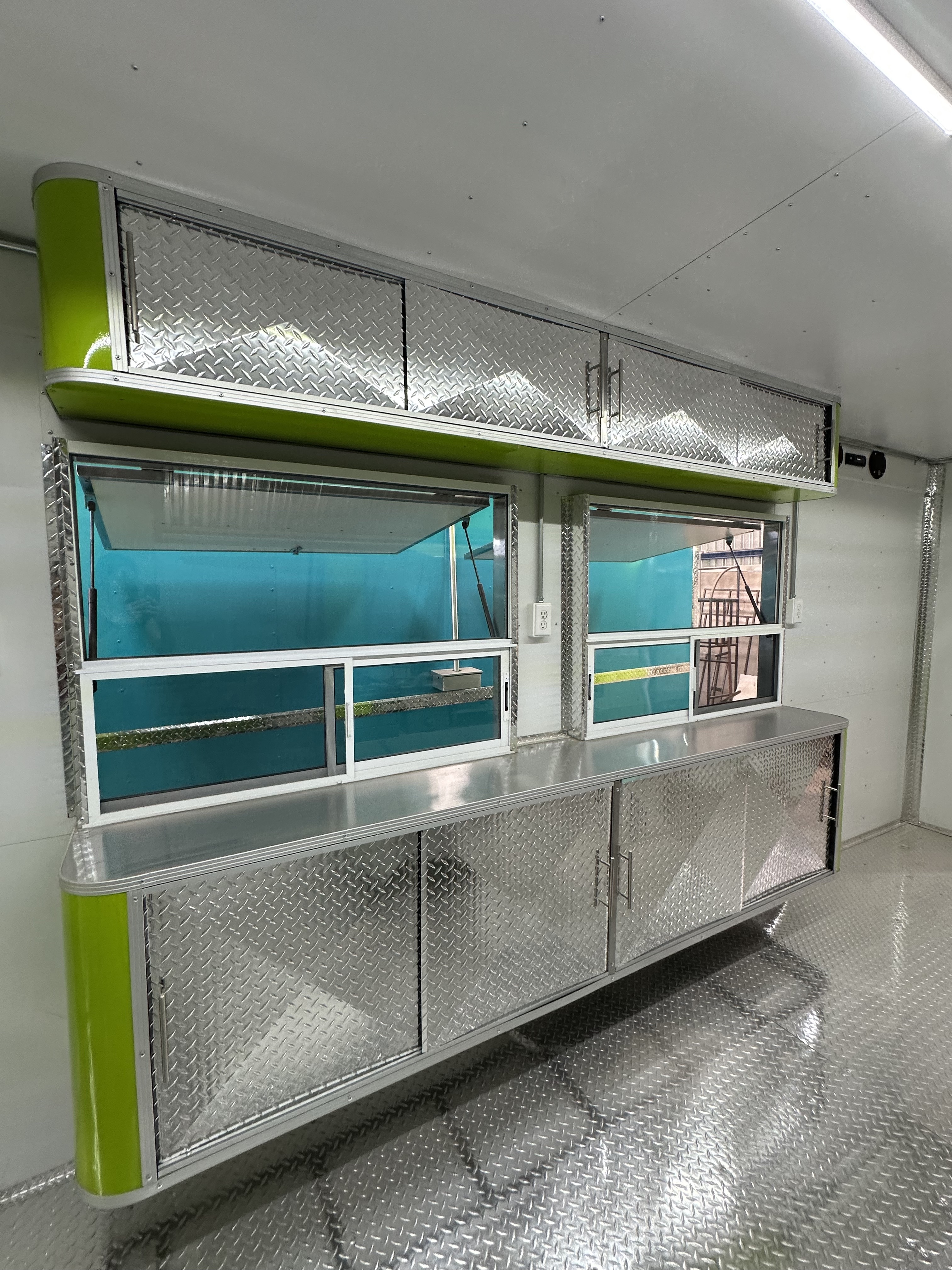Bain-Marie and storage cabinets in food trailer interior
